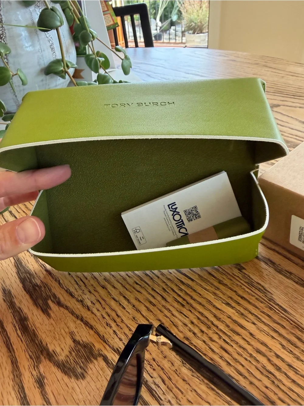 Tory Burch Black Frame Sunglasses with Violet Polarized Lenses